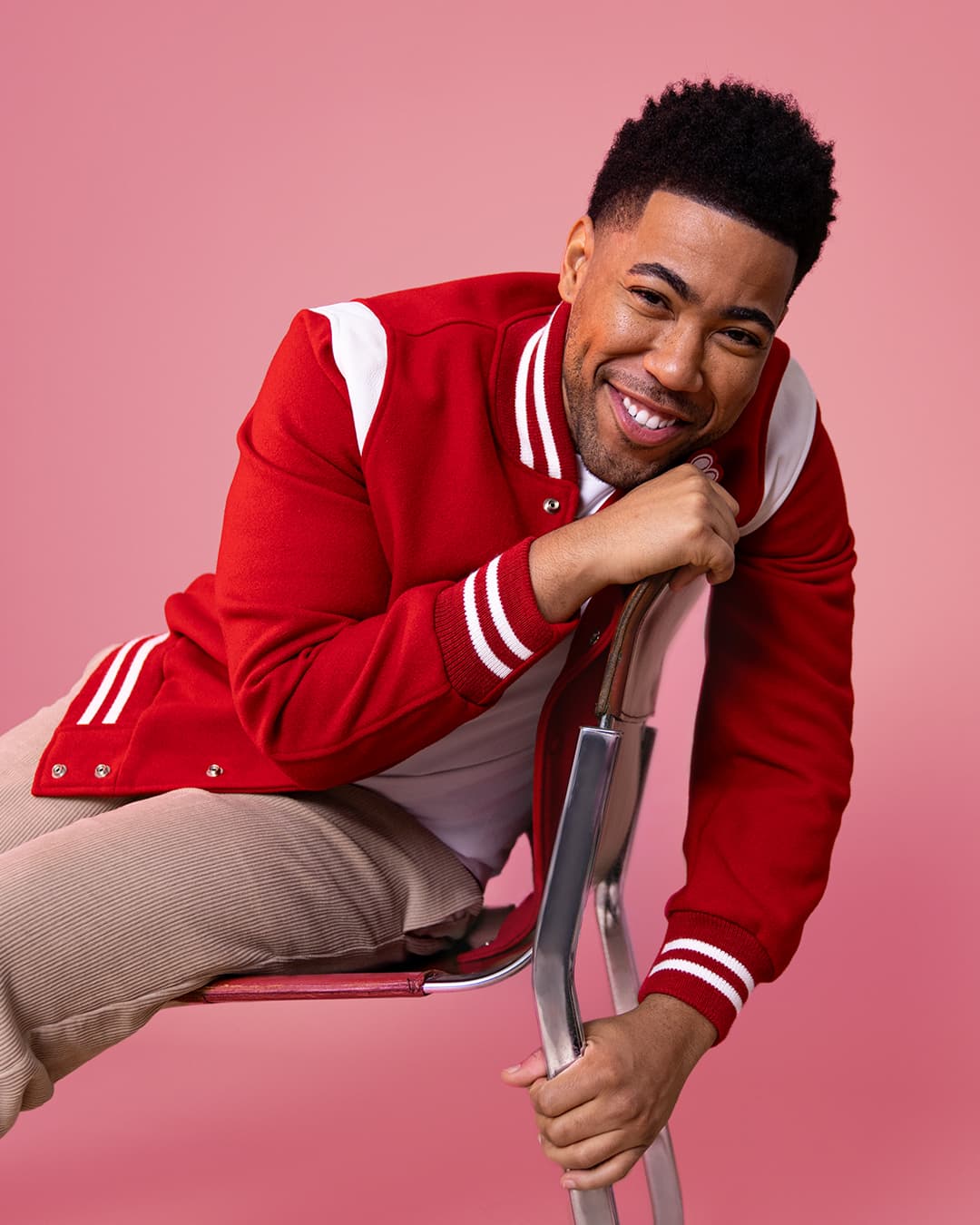 Jake from State Farm sitting in a chair | Statefarm.com